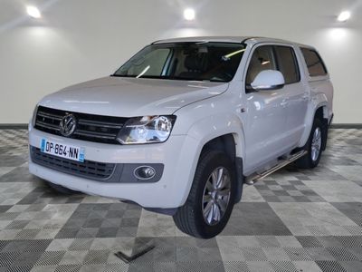 a picture of a white volkswagen pickup truck parked on a checkered floor