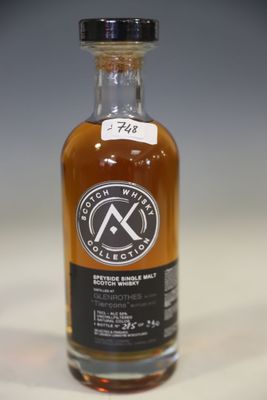 an empty bottle of whiskey sitting on a table