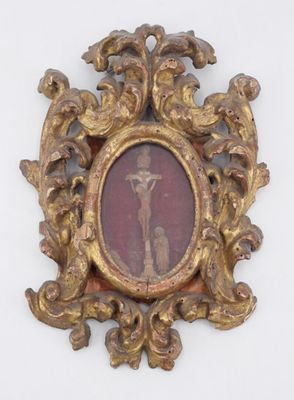 a gold frame with a picture of a man and a dog