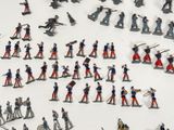a lot of toy soldiers that are on the table