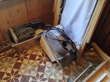a suitcase that is sitting on the floor next to a window