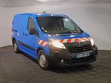 a blue van with a red and white stripe on it
