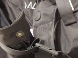 a close up of a jacket with a button on it