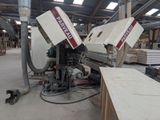 two machines that are sitting in a building