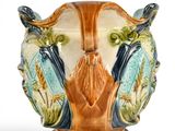 an image of a vase on a stand on a white background