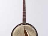 a close up of a banjo on a white background with a white background