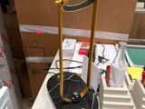 a lamp that is sitting on a table in a room