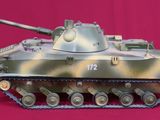 an image of a model of a tank on a pink background