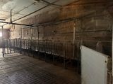 a room that has a bunch of stalls in it