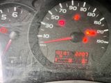 a close up of a speedometer in a car