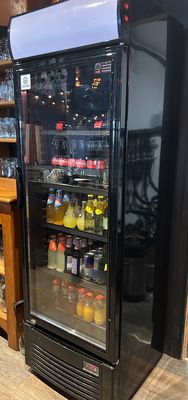 a refrigerator that is sitting inside of a room