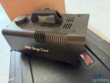 a black machine that is sitting on top of a box