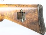 a close up of a rifle on a white background