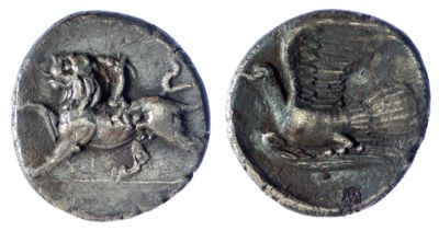 a close up of a coin with a lion on it