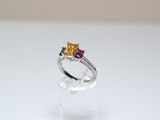 a close up of a ring on a clear surface with a white background