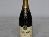 a bottle of wine that is sitting on a table