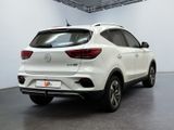 the rear end of a white suv parked in a garage