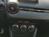 the dashboard of a car with a digital display in the center