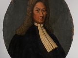 portrait d'un homme vêtu d'un manteau noir à col blanc