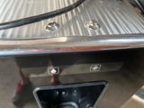 a close up of a toaster on a table