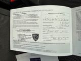 a passport sitting on top of a piece of paper