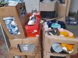several cardboard boxes stacked on top of each other in a room
