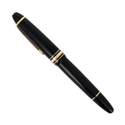 un stylo noir et doré, orné d'une bordure dorée, sur fond blanc