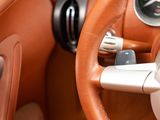 a close up of a steering wheel in a car