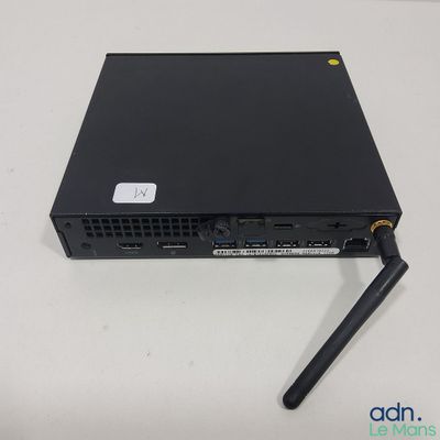 une image représentant un ordinateur portable sur lequel est posée une souris
