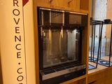 an image of a commercial coffee machine in a coffee shop