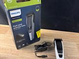 une boîte de tondeuses à cheveux Philips posée sur une table