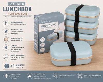 four lunchboxs sitting on a table next to a box of food