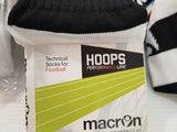a pair of black and white socks on a table