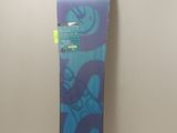 a snowboard hanging on a wall in a room