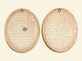 two circular wooden plaques with a diamond on them