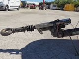 a close up of the handle of a motorcycle in a parking lot