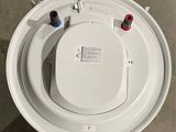 an overhead view of a toilet bowl with a lid