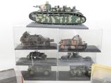 many different models of military vehicles displayed in a display case