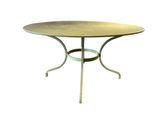 une image représentant une table ronde avec un piètement métallique sur fond blanc