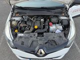 the engine of a car with its hood open and the hood open