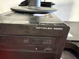 a computer that is sitting on top of a desk