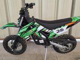 a dirt bike that is parked in front of a building