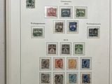 an open book with a bunch of different stamps on it
