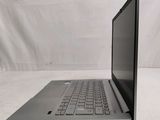 a laptop that is sitting on a white surface