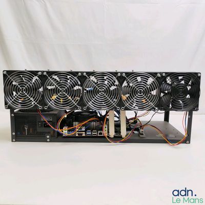 an image of a computer power supply unit with fan and power supply