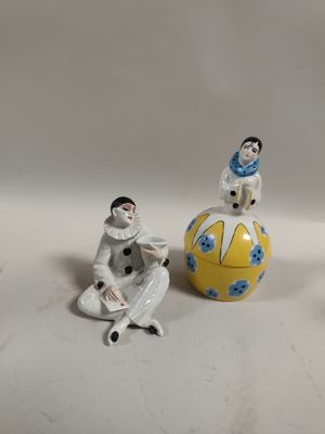 three figurines that are sitting on a table