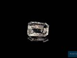 an uncut diamond on a black background