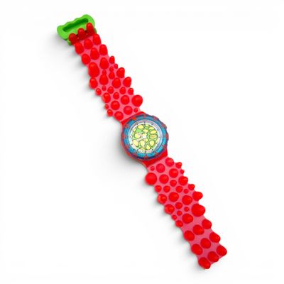 a close up of a red watch with a green band