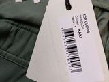 the back of a pair of pants with a tag on it