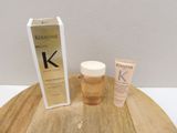 a bottle of kerastase and a tube of krastase on a wooden table